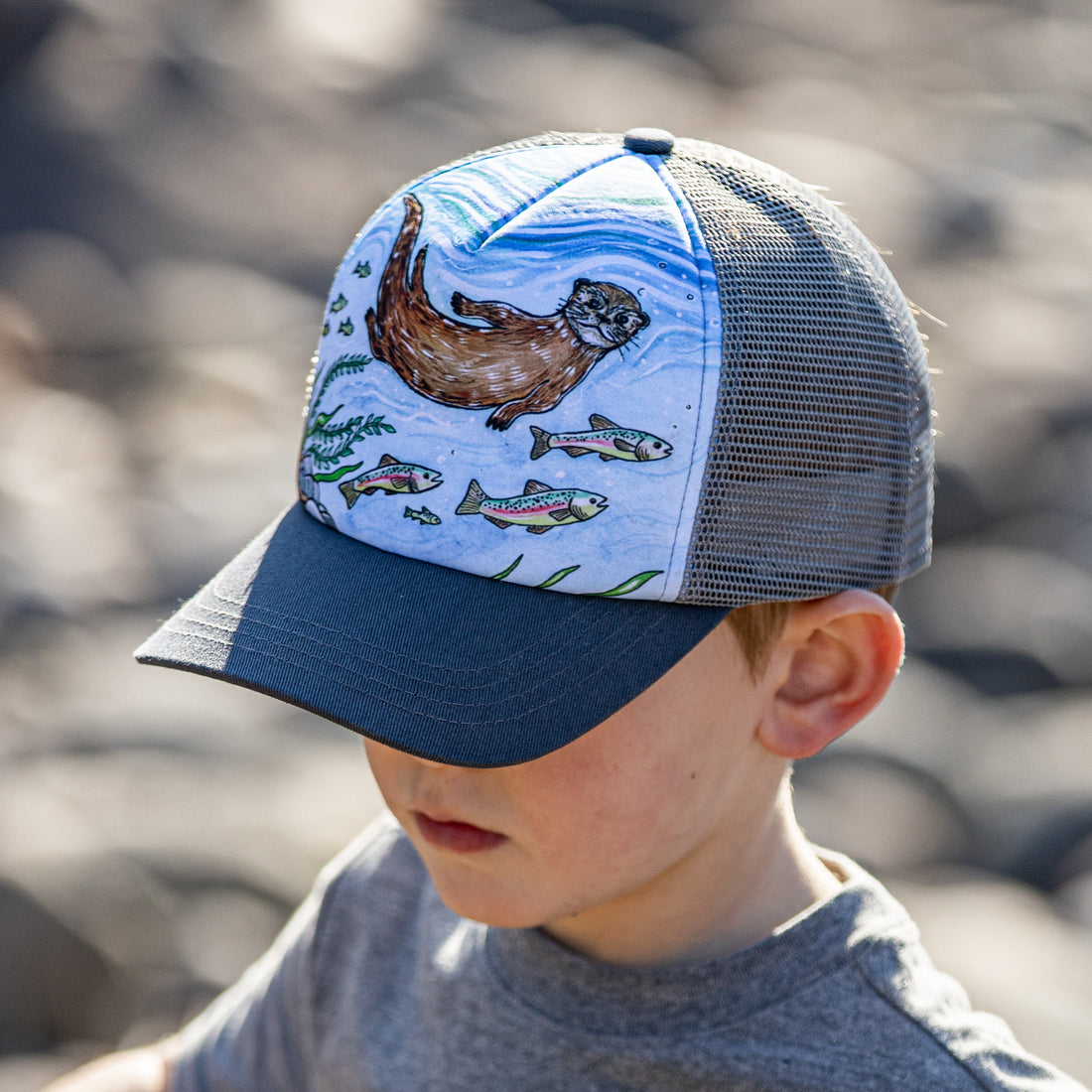 Boy wearing a Sunday Afternoons River Otter Trucker